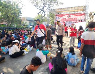 PLN Jatim Dukung Kegiatan Jalan Sehat & Bazaar UMKM Warga Sidotopo
