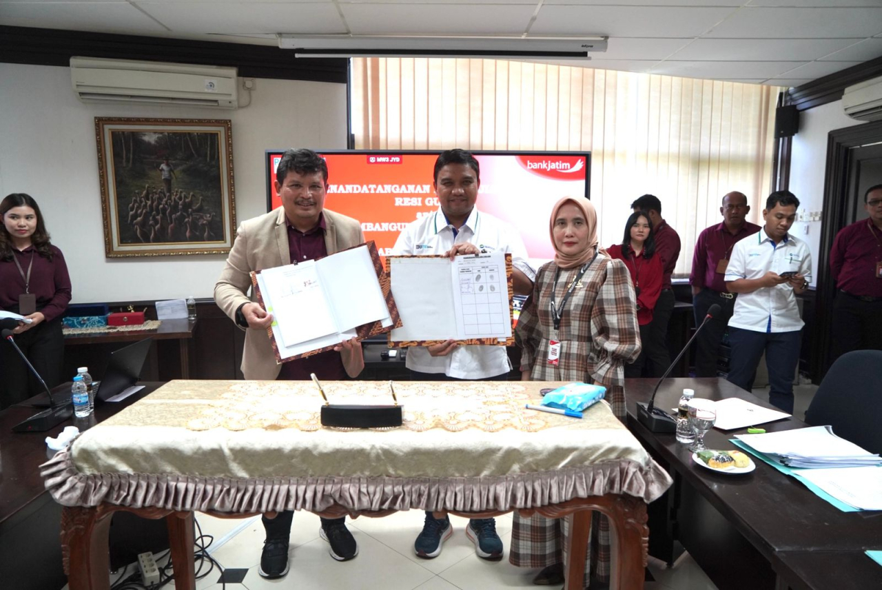 Kegiatan penandatanganan kerja sama Resi Gudang Bank Jatim dengan PG Rajawali I. Foto : BJTM